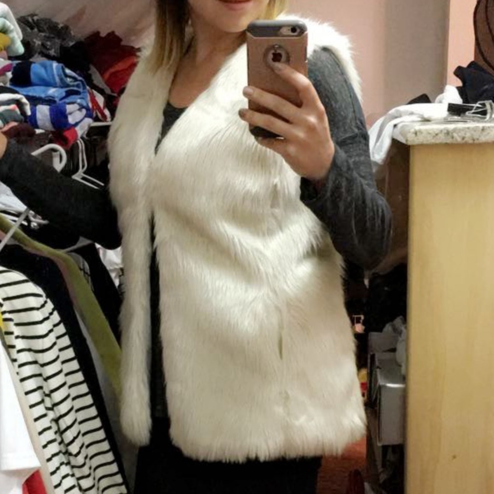 White faux fur vest